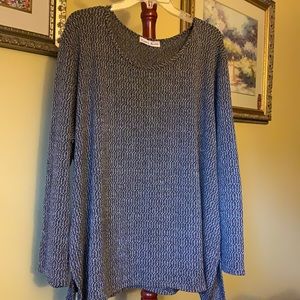 Being & brown sweater